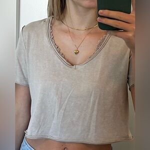 Tan v-neck top with lace detailing